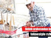 Bebek arabasından bozma ekmek teknesiyle rızkını arıyor