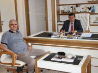Turan Güney'den İkiz'e ziyaretTuran Güney'den İkiz'e ziyaret