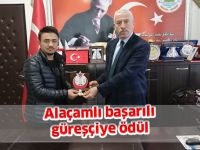 Alaçamlı başarılı güreşçiye ödül