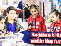 Harçlıklarını biriktiren minikler kitap fuarında