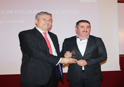 Başkan Köktaş'a 15 yıl plaketi