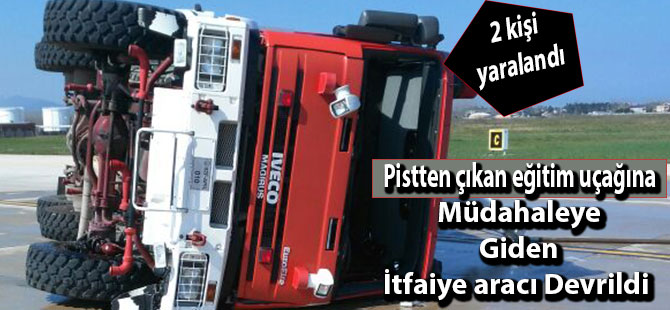 Pistten çıkan eğitim uçağına müdahaleye giden itfaiye aracı devrildi