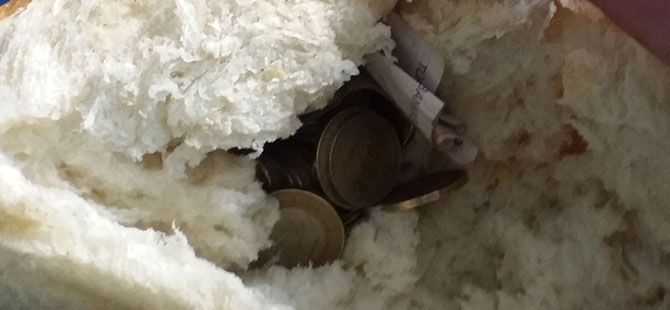 TOPLADIĞI PARALAR EKMEĞİN İÇİNDEN ÇIKTI