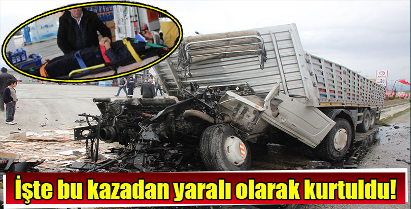 Su kanalına devrilen tırın sürücüsü yaralandı