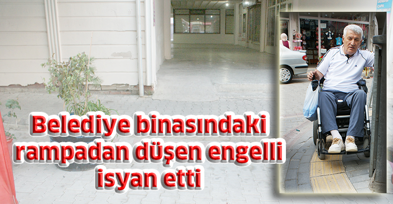 Belediye binasındaki rampadan düşen engelli isyan etti
