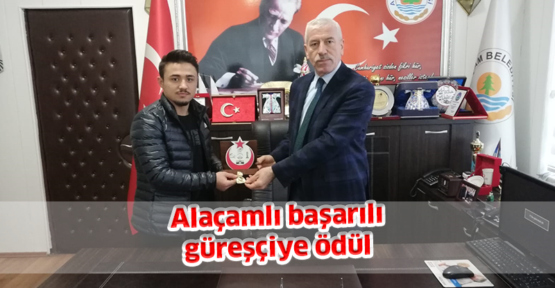 Alaçamlı başarılı güreşçiye ödül