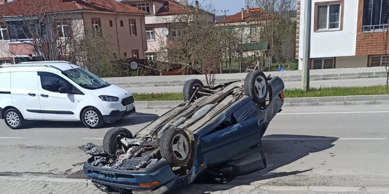 Devrilen otomobilin sürücüsü yaralandı