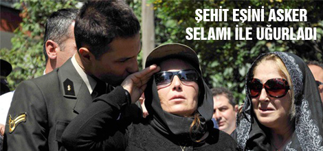 Şehit eşini asker selamı ile uğurladı