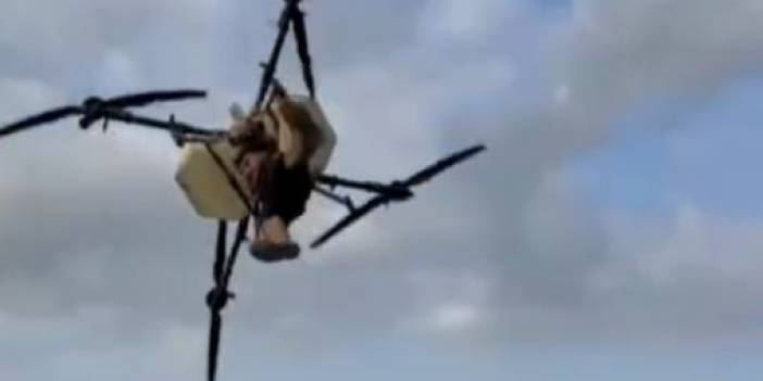 Tarım dronuna tutunan çiftçi düştü